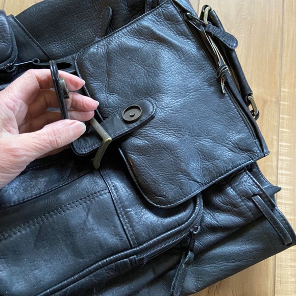 Rare Leather Back pack . Color is black . Brand is Latico .